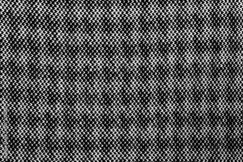 White Black natural texture of knitted wool textile material background. White-black crochet cotton fabric woven canvas texture. close up