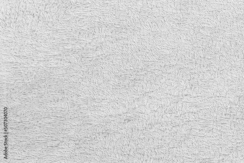 White fabric soft texture of a terry towel close-up.