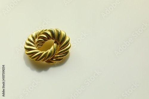 Fototapet Abstract design vintage brooch pin costume jewelry fashion accessory
