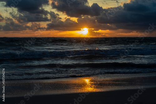 Seascape in the morning  sunrise above water.