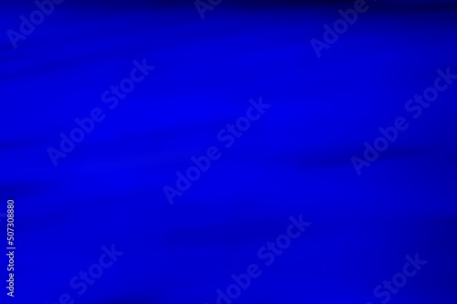 Dark blue abstract blurred background.