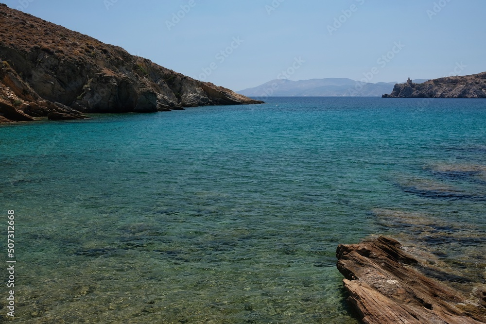 View of the rocky beach of Valmas in Ios Greece