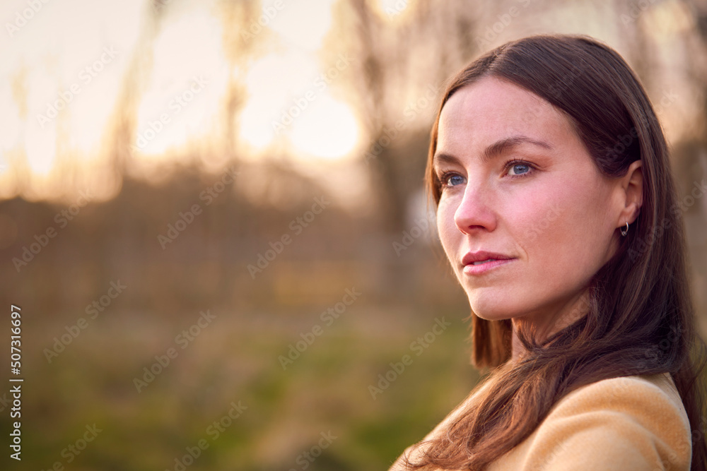 Head And Shoulders Portrait Of Woman On Walk Through Autumn Or Winter Countryside Head And Shoulders Portrait Of Woman On Walk Through Autumn Or Winter Countryside