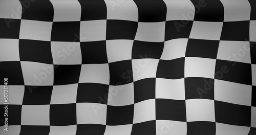 Image of checkered black and white finish line flag waving