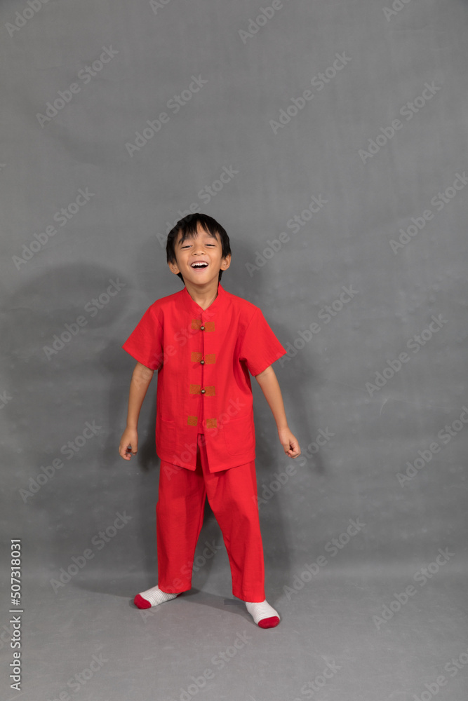 little boy fashion Smiling child in red chinese dress, style and fashion ideas for children. little boy fashion Smiling child in red chinese dress, style and fashion ideas for children.