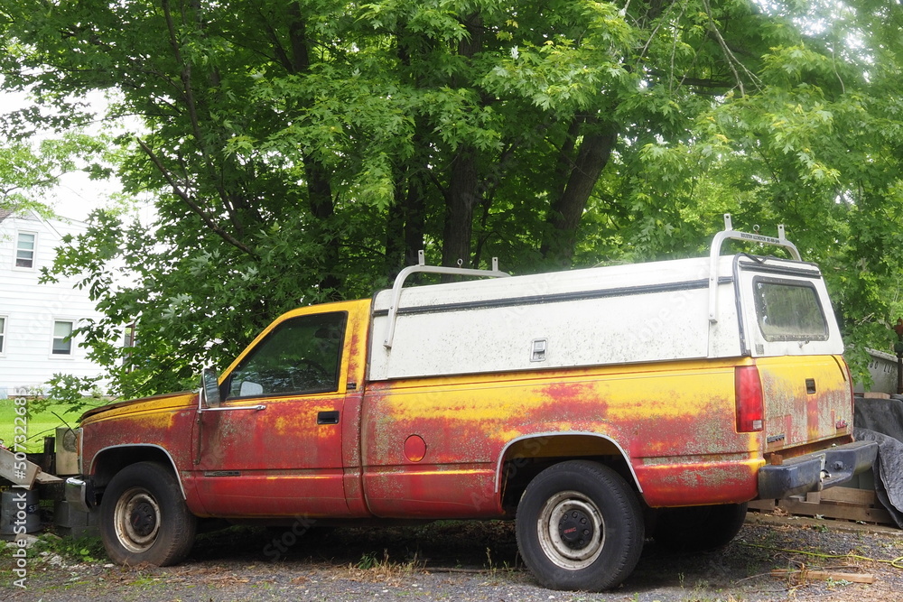 The old truck has been painted with bright colors. The old truck has been painted with bright colors.