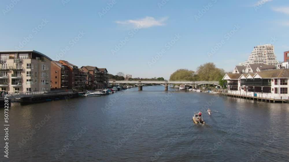 People kayaking near Kingston Upon Thames river, aerial low altitude view People kayaking near Kingston Upon Thames river, aerial low altitude view