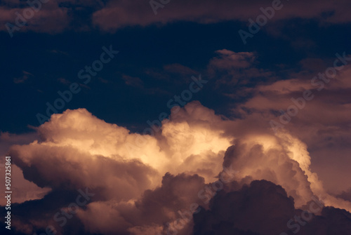 Clouds on the horizon play of light and shadow, celestial space with dramatic clouds, signs of rain.