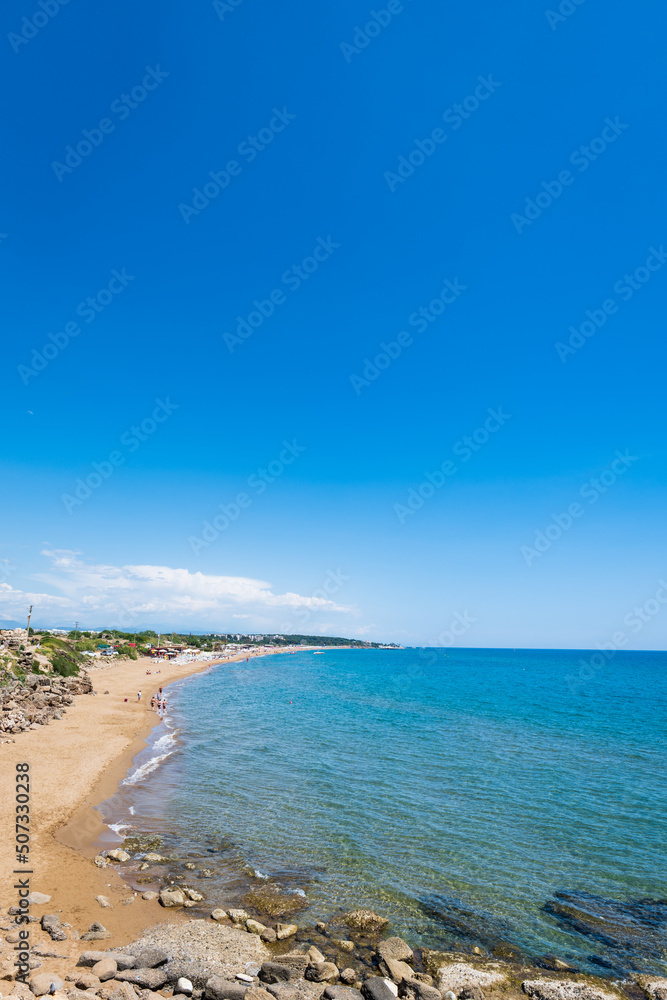 Side beach landscape view. Side is a popular tourist resort town near Antalya, Turkey by the Mediterranean sea. 