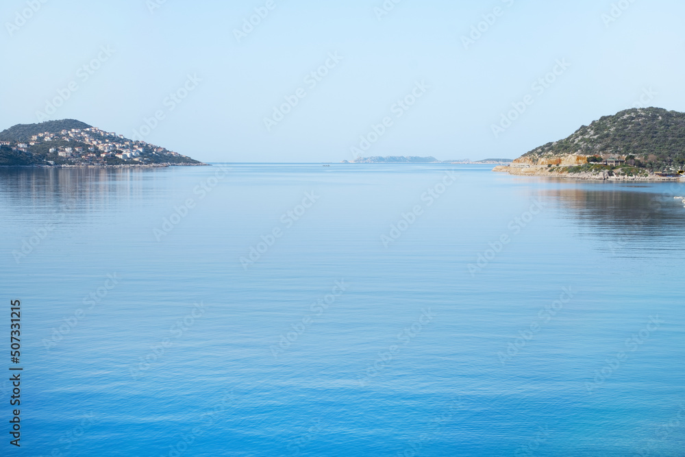 Beautiful breathtaking view at Meditarrenean sea and mountains in Turkey,Antalya region, in morning.Copy space.Calmness, tranquility,beauty in nature concept.Natural background.Calm water Beautiful breathtaking view at Meditarrenean sea and mountains in Turkey,Antalya region, in morning.Copy space.Calmness, tranquility,beauty in nature concept.Natural background.Calm water