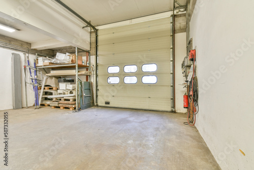 Empty industrial room with oval shaped windows photo