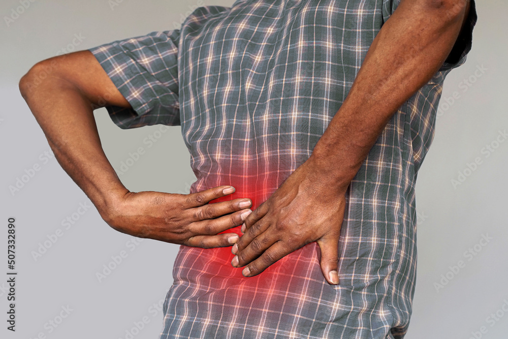 African man with low back pain. Kidneys pain, urolithiasis disease