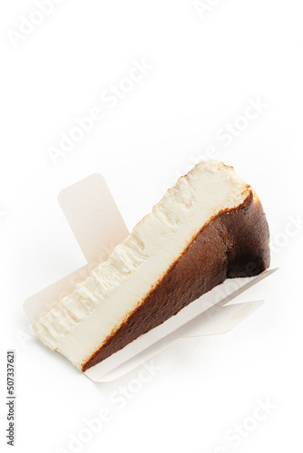 san sebastian cheesecake on white background