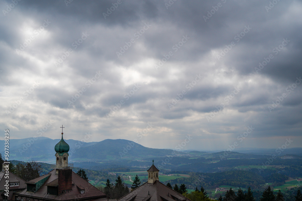 Landscape photos in the Bavarian Forest with fascinating clouds and blue sky
