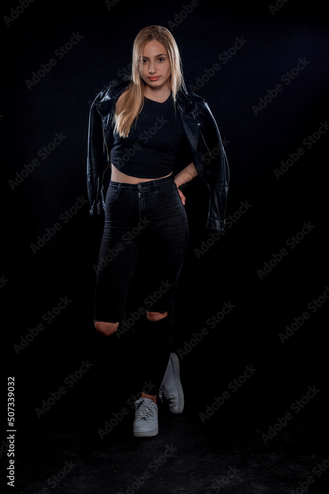 Beautiful modern girl posing in studio Beautiful modern girl posing in studio