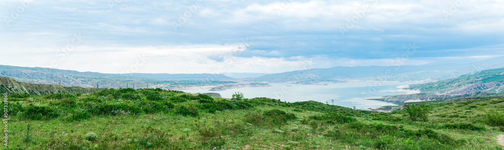 panorama with mountain landscape in the vicinity of the reservoir of the Chirkey hydroelectric power station in Dagestan