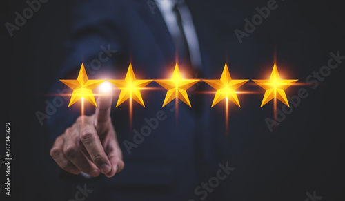 Businessman Satisfaction Assessments for Top Performing Businesses,Customer gives rating to service experience photo