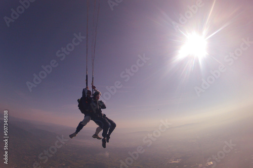 jump with an instructor in tandem in evening and clear good weather, before sunset