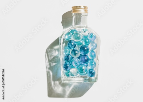 【夏】青色のビー玉とガラスボトル　フィルム風 photo