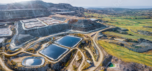 Copper ore solvent extraction at Skouriotissa mine in Cyprus. Leaching heaps and storage reservoirs  photo
