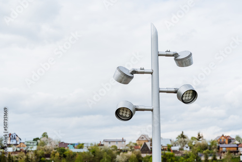 Street lamppost, modern lighting of the city park, street lamp, LED lamp euro standard, design of urban lighting.