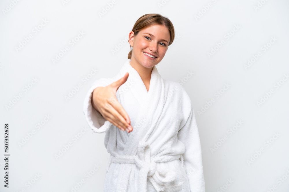 Young pretty blonde woman in bathrobe isolated on white background shaking hands for closing a good deal Young pretty blonde woman in bathrobe isolated on white background shaking hands for closing a good deal