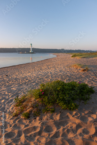 Falckensteiner Strand mit Leuchtturm an der Kieler Förde. photo