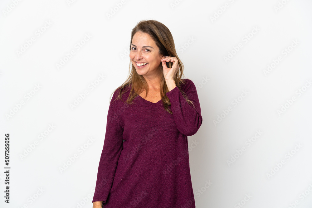 Middle age Brazilian woman isolated on white background laughing Middle age Brazilian woman isolated on white background laughing