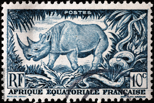 Black rhinoceros on ancient african postage stamp