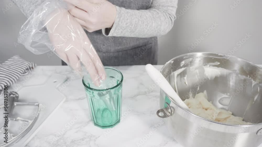 Time lapse. Step by step. Mixing ingredients in a standing kitchen mixer to prepare cream cheese frosting. Time lapse. Step by step. Mixing ingredients in a standing kitchen mixer to prepare cream cheese frosting.