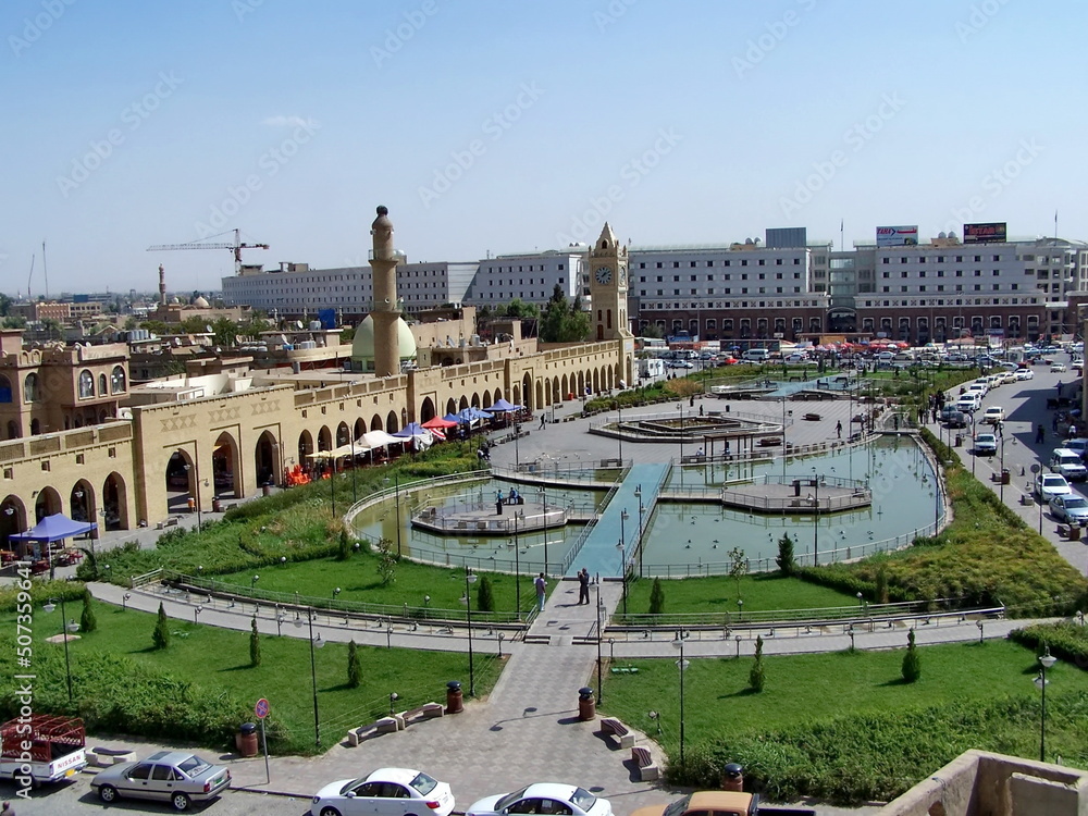 Pool and fountains in front of the Qaysari Bazaar seen from the Citadel above in Erbil, Kurdistan, Iraq