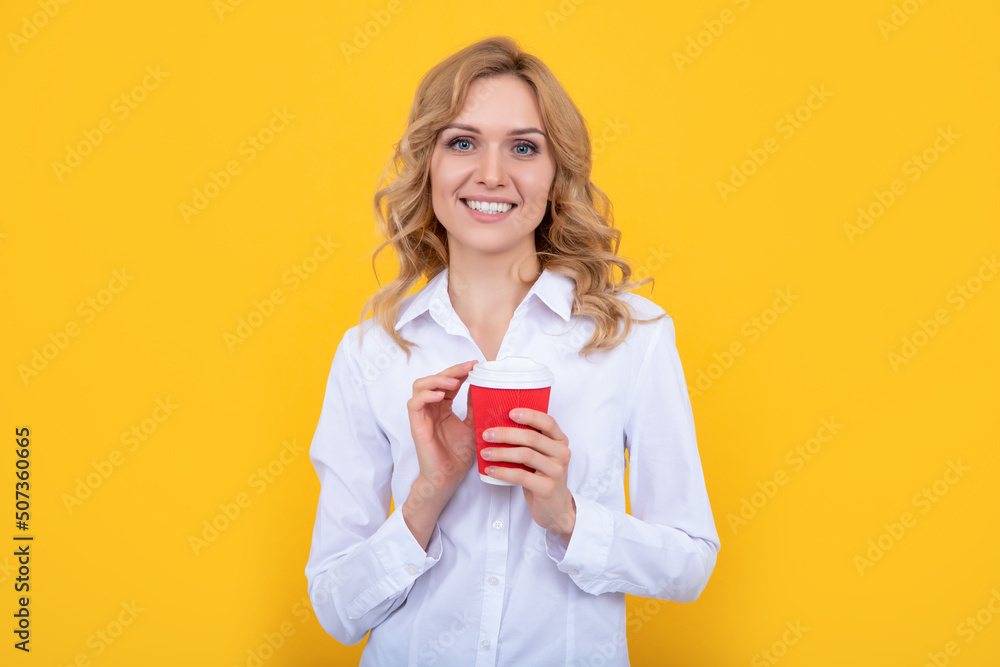 positive blond woman with coffee cup on yellow background positive blond woman with coffee cup on yellow background