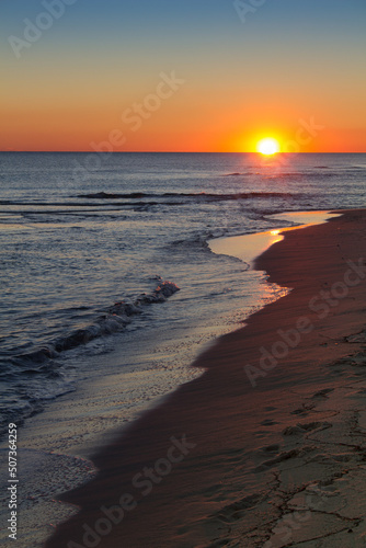 Fototapeta Naklejka Na Ścianę i Meble -  Vertical Beach Sunset
