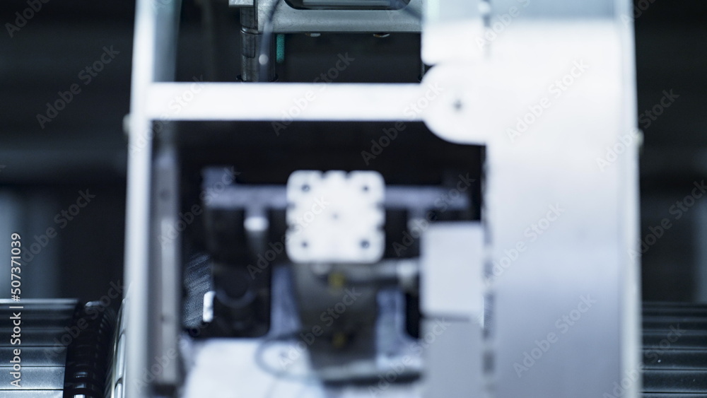 Closeup rubber tire manufacturing machine spinning in automotive manufacture Closeup rubber tire manufacturing machine spinning in automotive manufacture