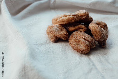 Bakery products. Homemade cookies with sugar on a towel background. Background image, copy space.