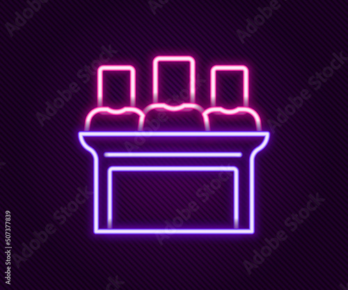 Glowing neon line Jurors icon isolated on black background. Colorful outline concept. Vector