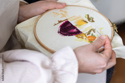 Bilde på lerret Cross-stitch embroidering in progress