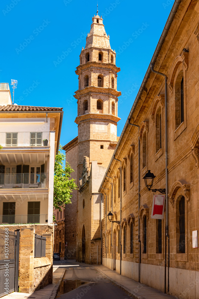 Old street of the Spanish city of Palma de Mallorca. stone tower