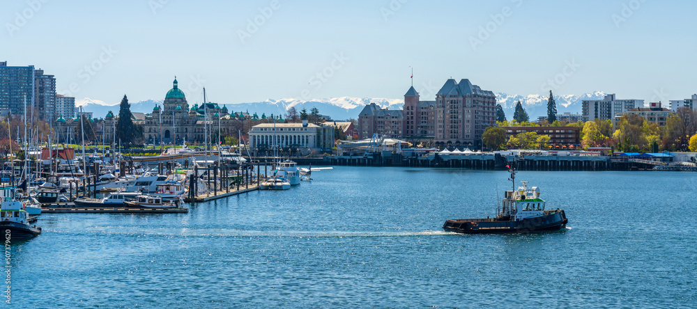Victoria Inner Harbour. Historical buildings in the background over blue sky. Panoramic view. - obrazy, fototapety, plakaty 