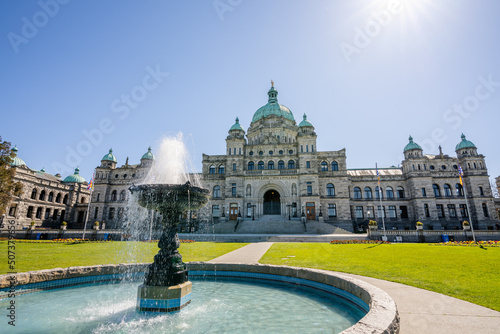 Victoria, BC, Canada - April 14 2021 : British Columbia Parliament Buildings. Legislative Assembly Fountain.