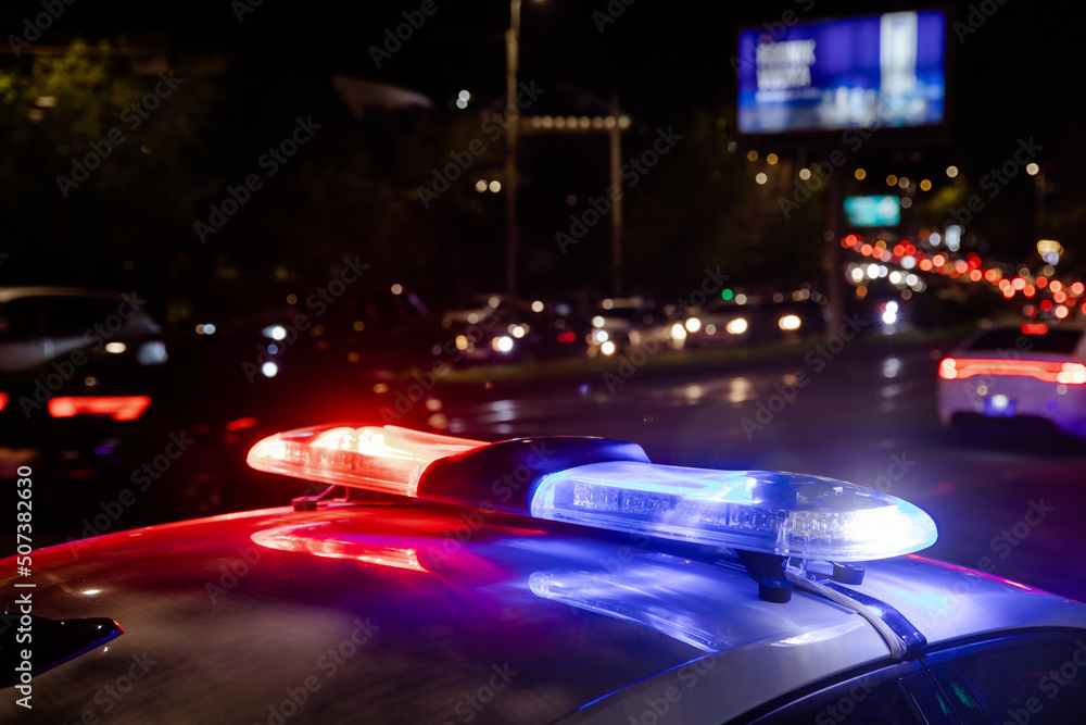 police car lights at night in city police car lights at night in city
