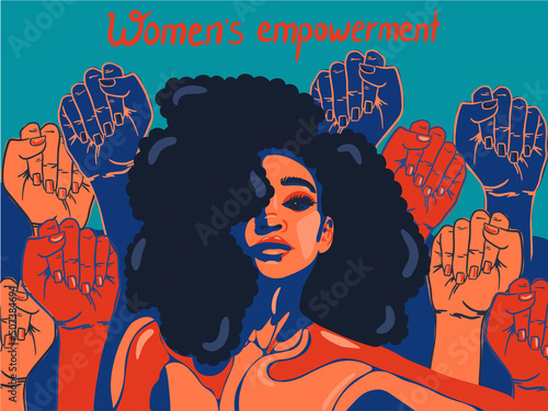 An elegant strong woman on the background of hands with a sign of equality, women's rights, unity and strength. Women's solidarity and women's empowerment. Women's rights concept