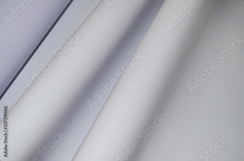 Foto wavy texture of white flexion fabric with stripes