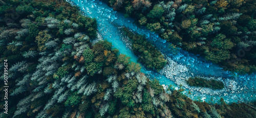 Drone aerial top view of mountain river and forest