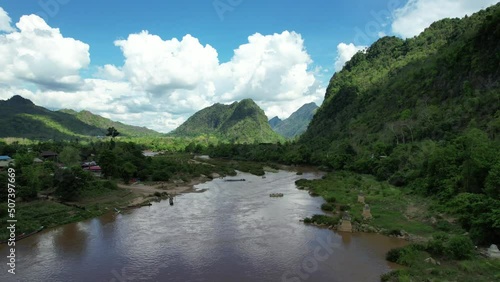 Aerial view of mountains and white pagoda by the Moei river, Thailand-Myanmar border by drone photo