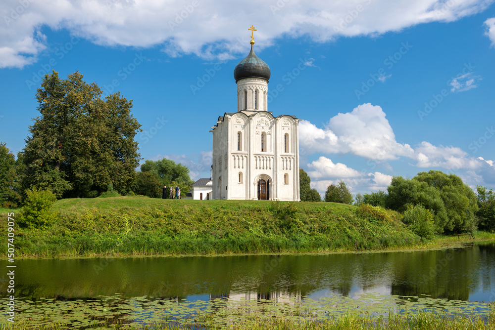 View of the medieval Church of the Intercession on the Nerl on a sunny August day. Bogolyubovo, Golden Ring of Russia