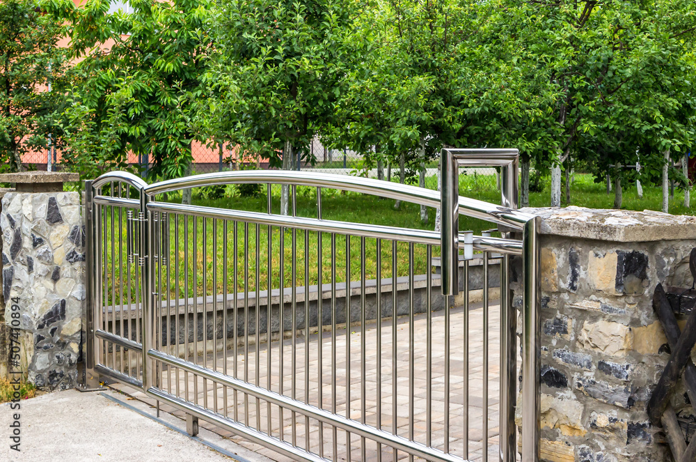Chrome fence gate. Stainless steel fence
Chrome fence gate. Stainless steel fence