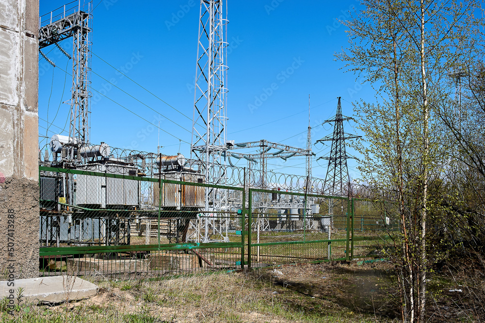 high-voltage electrical substation against the blue sky