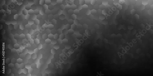 Dark gray vector texture with colorful hexagons.