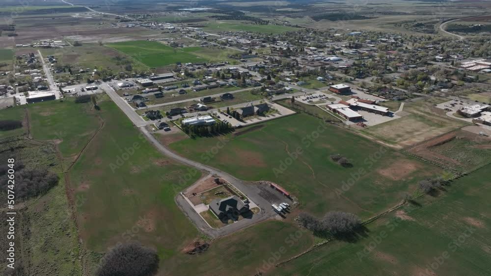 Aerial Monticello Utah city church part 1. Settled in July 1887 by pioneers from The Church of Jesus Christ of Latter-day Saints. Uranium mine and refinery mill boom from the late 1940s. Aerial Monticello Utah city church part 1. Settled in July 1887 by pioneers from The Church of Jesus Christ of Latter-day Saints. Uranium mine and refinery mill boom from the late 1940s.